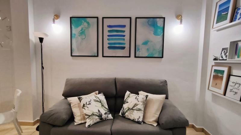 Caledonia Park Beachfront Luxury Apartment living room with sofa