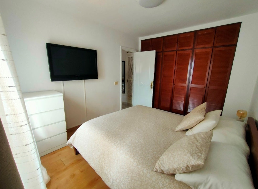 Costa Adeje Balcon del Atlantico Magnificent Apartment Bedroom with queen-size bed and flat-screen tv
