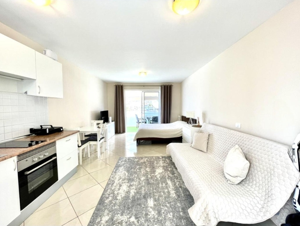 Costa Adeje Perfect Investor Apartment Living room and queen-size bed