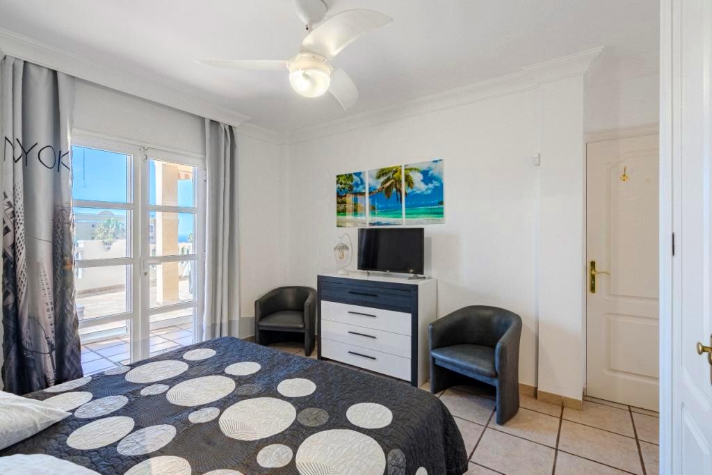 Fanabe Exclusive Benimar Complex Apartment Tenerife Fully Equipped bedroom with flat-screen tv