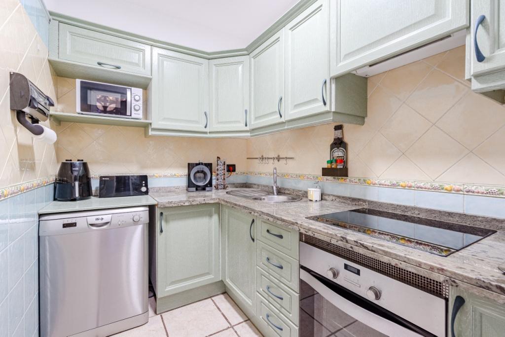 Fanabe Exclusive Benimar Complex Apartment Tenerife Fully Equipped kitchen with modern amenities