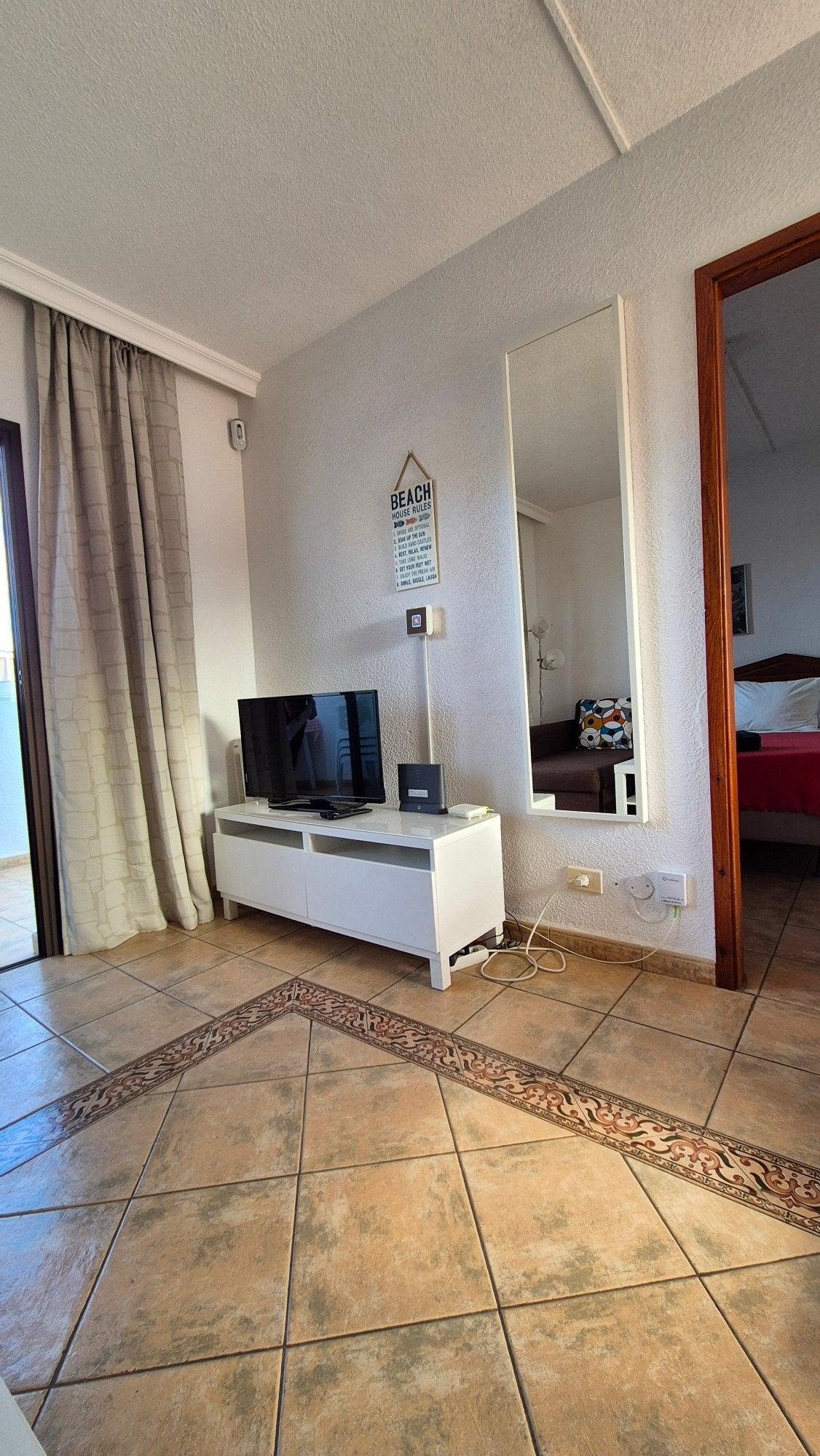 Las Americas Cattleya Ocean Oasis Apartment cozy living room with flat-screen tv