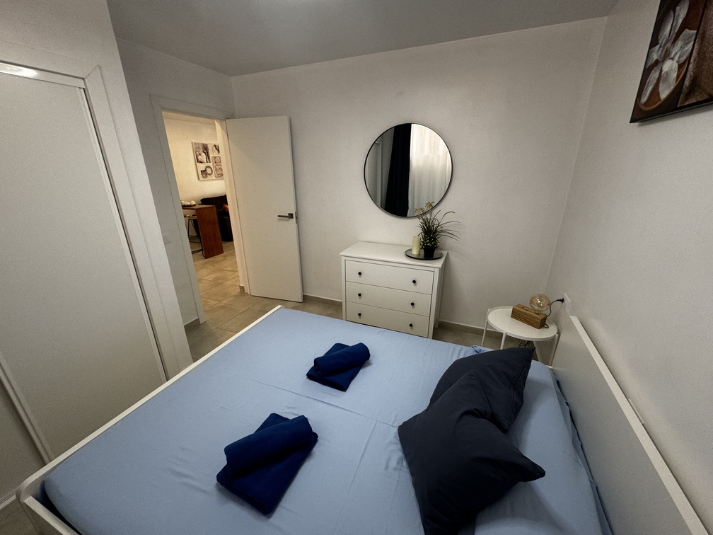 Los Cristianos Los Diamantes Beautiful Apartment Bedroom queen-size bed and mirror