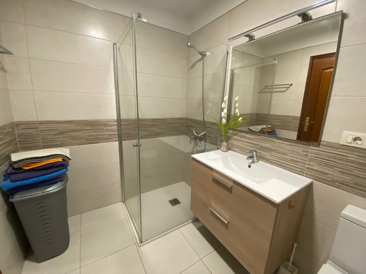 Los Cristianos Parque Tropical II Seafront Apartment Complex bathroom with floor access shower