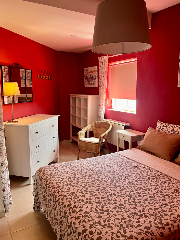 Magnificent Augusta Park Amarilla Golf Apartment bedroom with queen-size bed