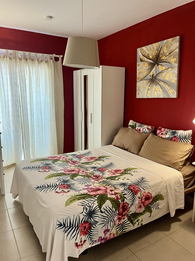 Magnificent Augusta Park Amarilla Golf Apartment bedroom with queen-size bed 4