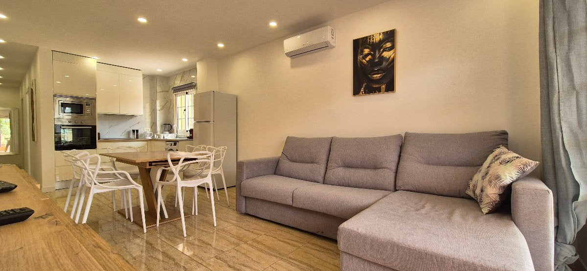 Palm Mar Unique Apartment Primavera Complex spacious living room with large sofa
