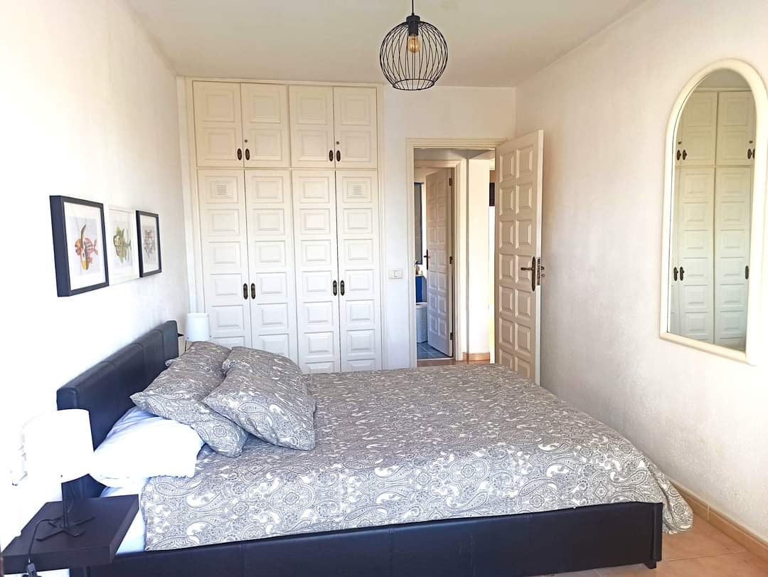 San Miguel de Abona Cozy House at Amarilla Golf spacious bedroom with queen-size bed