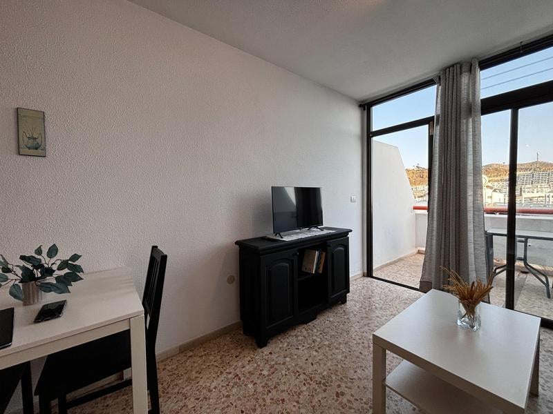 Spacious Apartment, Long-Term Rental, Adeje, Cozy living room with comfortable seating 2