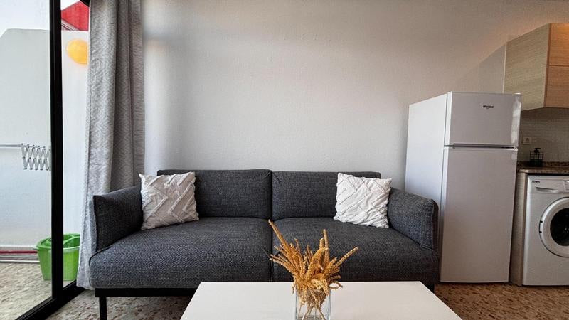 Spacious Apartment, Long-Term Rental, Adeje, Cozy living room with comfortable seating 3