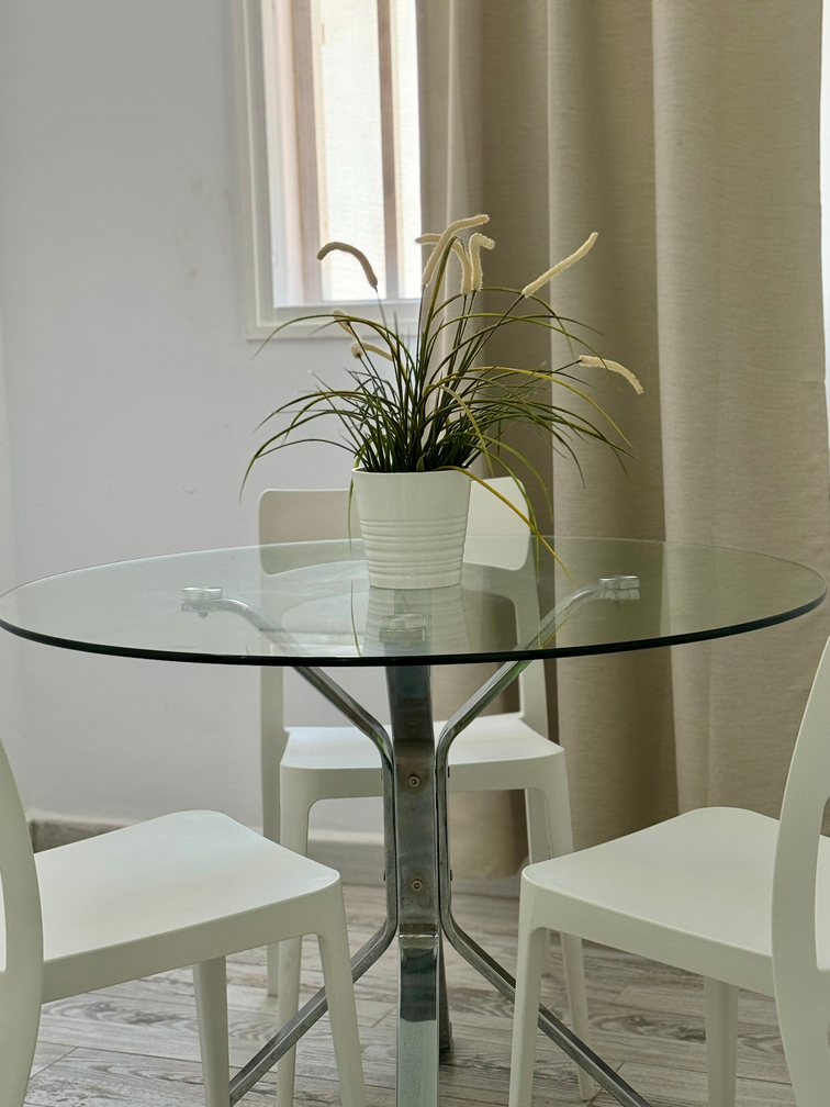 Costa_Adeje_Charming_Renovated_Apartment_living_room_fully_equipped_minimalist_glass_table