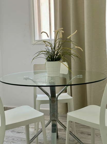 Costa_Adeje_Charming_Renovated_Apartment_living_room_fully_equipped_minimalist_glass_table