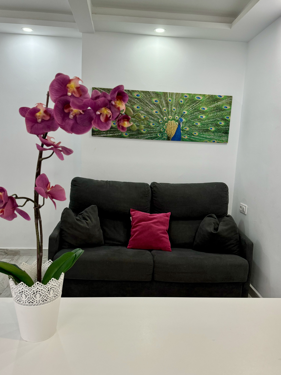 Costa_Adeje_Charming_Renovated_Apartment_living_room_fully_equipped_minimalist_large_sofa_bed