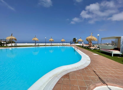 Costa Adeje Perfect Investor Apartment Complex pool solarium with stunning sea view