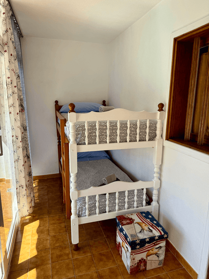 Fanabe_Stunning_Beachfront_Penthouse_Parque_Royal_Tenerife_bunk_beds_bedroom
