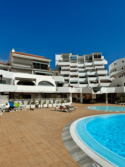 Fanabe_Stunning_Beachfront_Penthouse_Parque_Royal_Tenerife_pool_complex_view