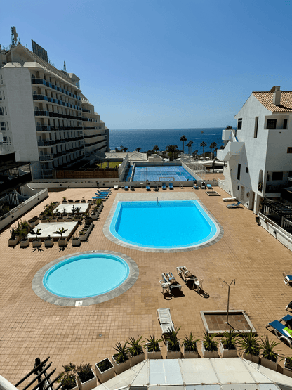Fanabe_Stunning_Beachfront_Penthouse_Parque_Royal_Tenerife_terrace_pools_view