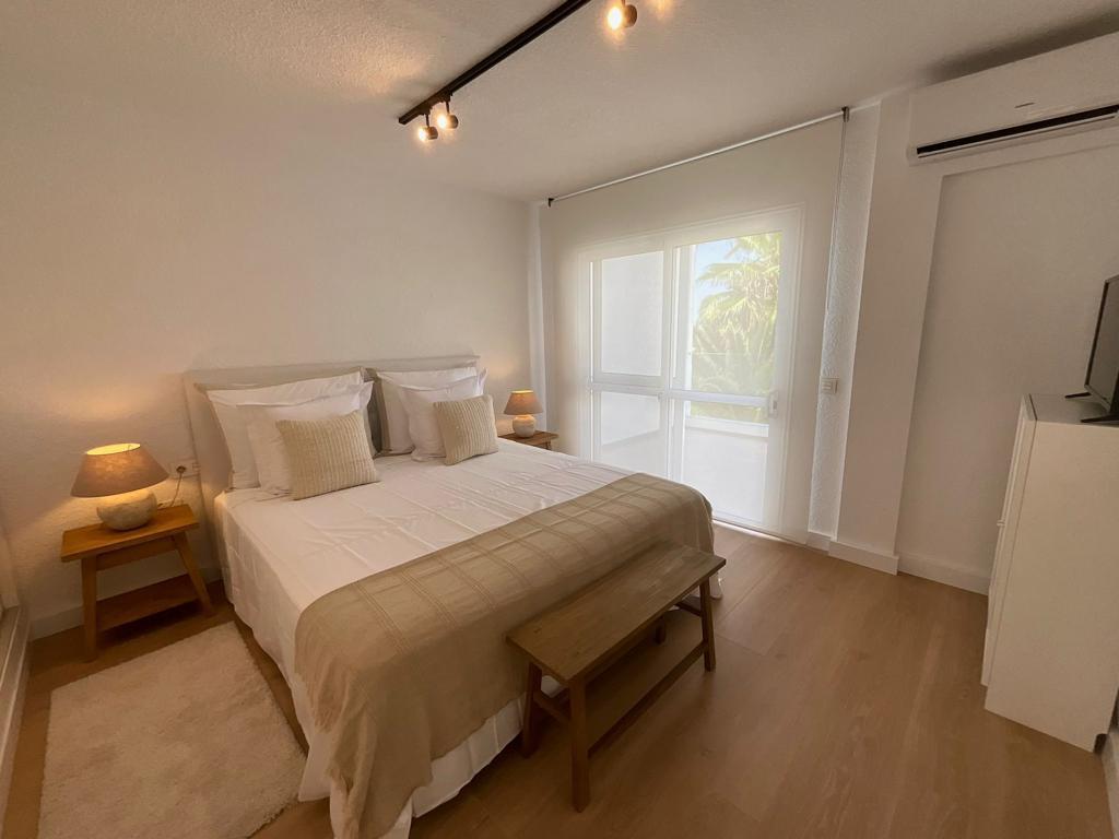 Golf Costa Adeje Luxury Villa Elegant bedroom with queen-size bed and flat-screen tv
