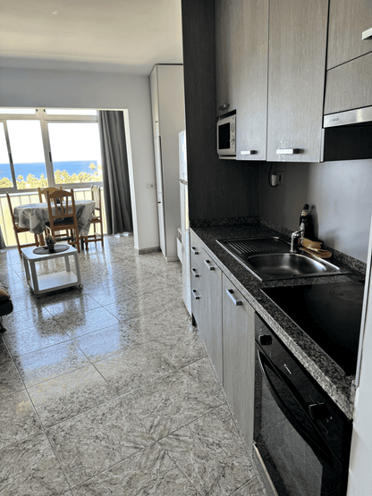 Heart_of_Las_Americas_Charming_Beach_Apartment_Tenerife_Kitchen_Living_Room