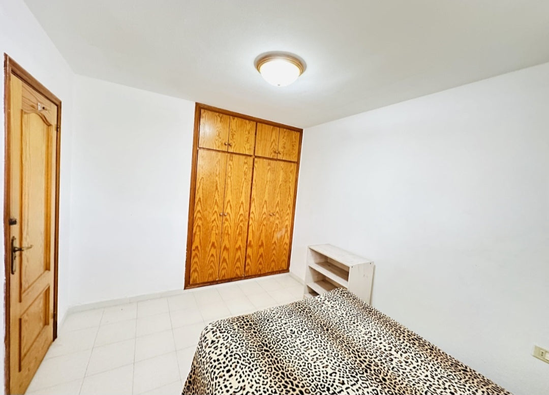 Heart of Los Cristianos Apartment Tenerife bedroom with queen-size bed amenities