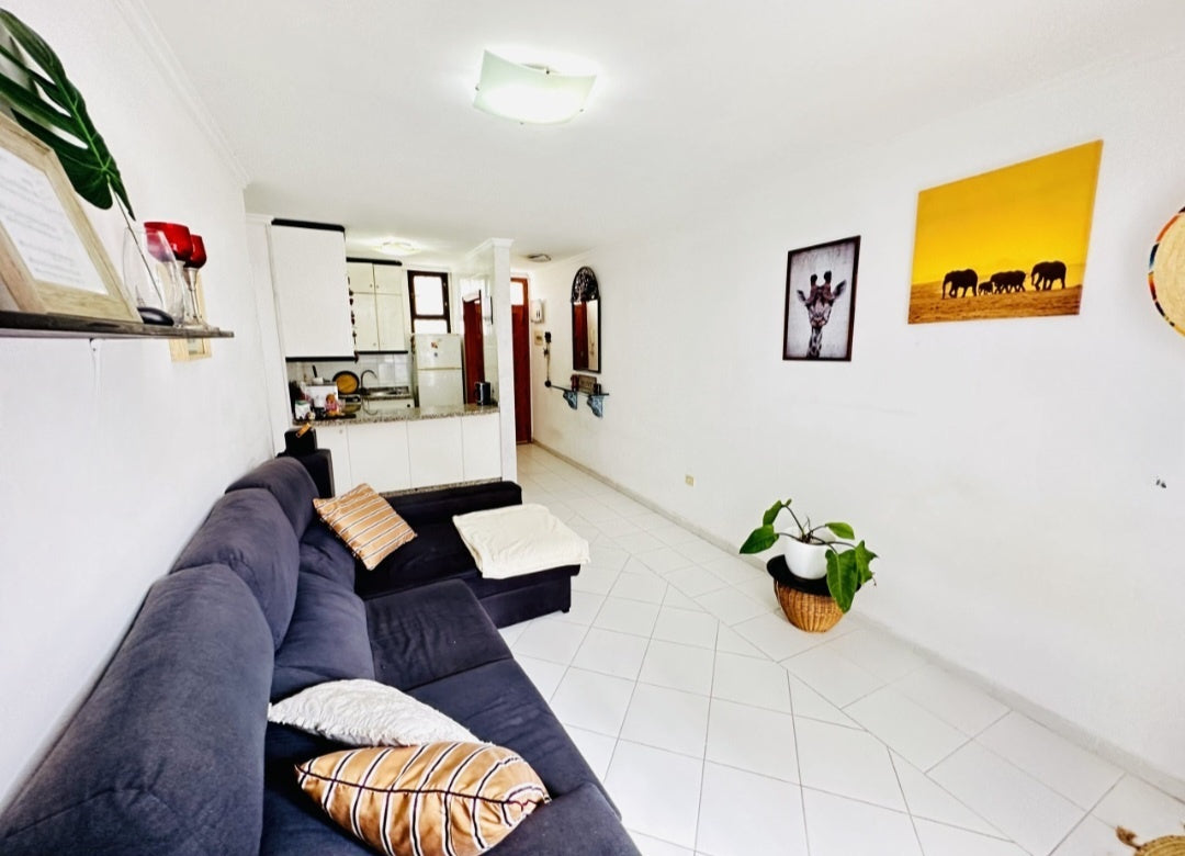 Heart of Los Cristianos Apartment Tenerife modern living room kitchen view