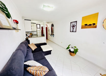 Heart of Los Cristianos Apartment Tenerife modern living room kitchen view