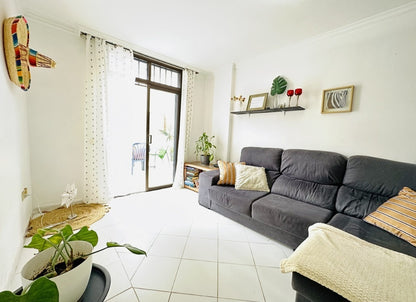 Heart of Los Cristianos Apartment Tenerife modern living room with large sofa