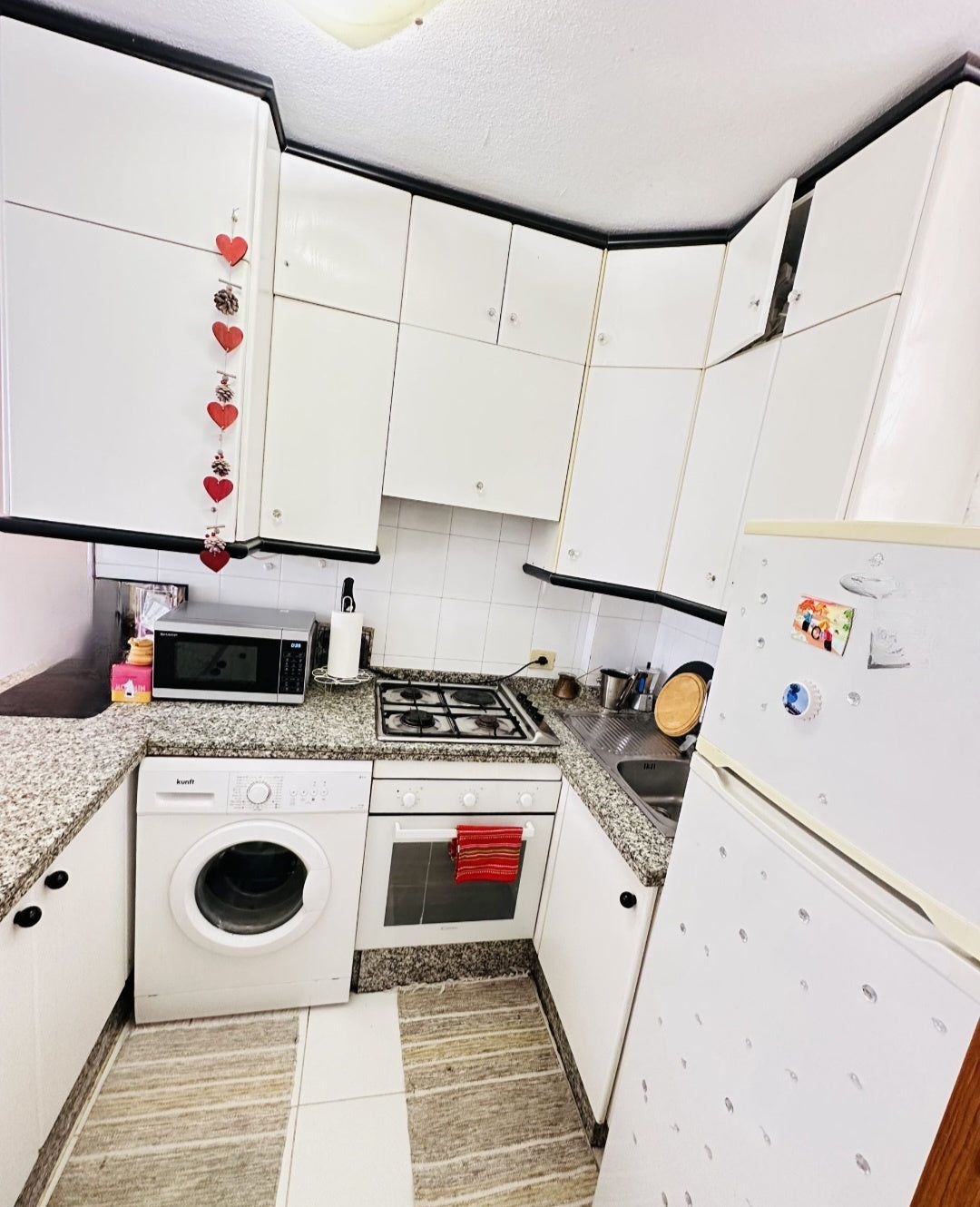 Heart of Los Cristianos Apartment Tenerife modern open plan kitchen washing machine