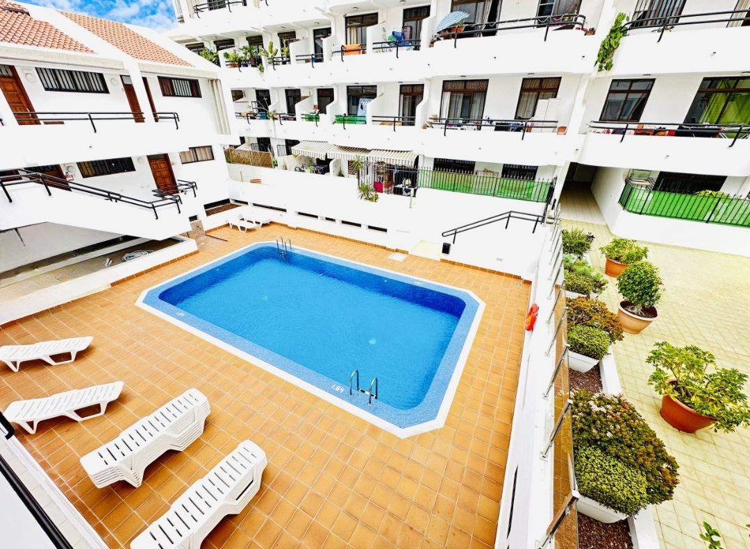 Heart of Los Cristianos Apartment Tenerife municipal pool view
