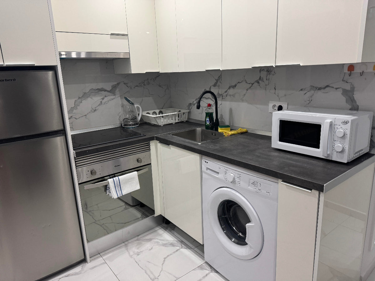 Heart_of_Los_Cristianos_Modern_Apartment_Close_to_the_Sea_in_Tenerife_fully_equipped_kitchen