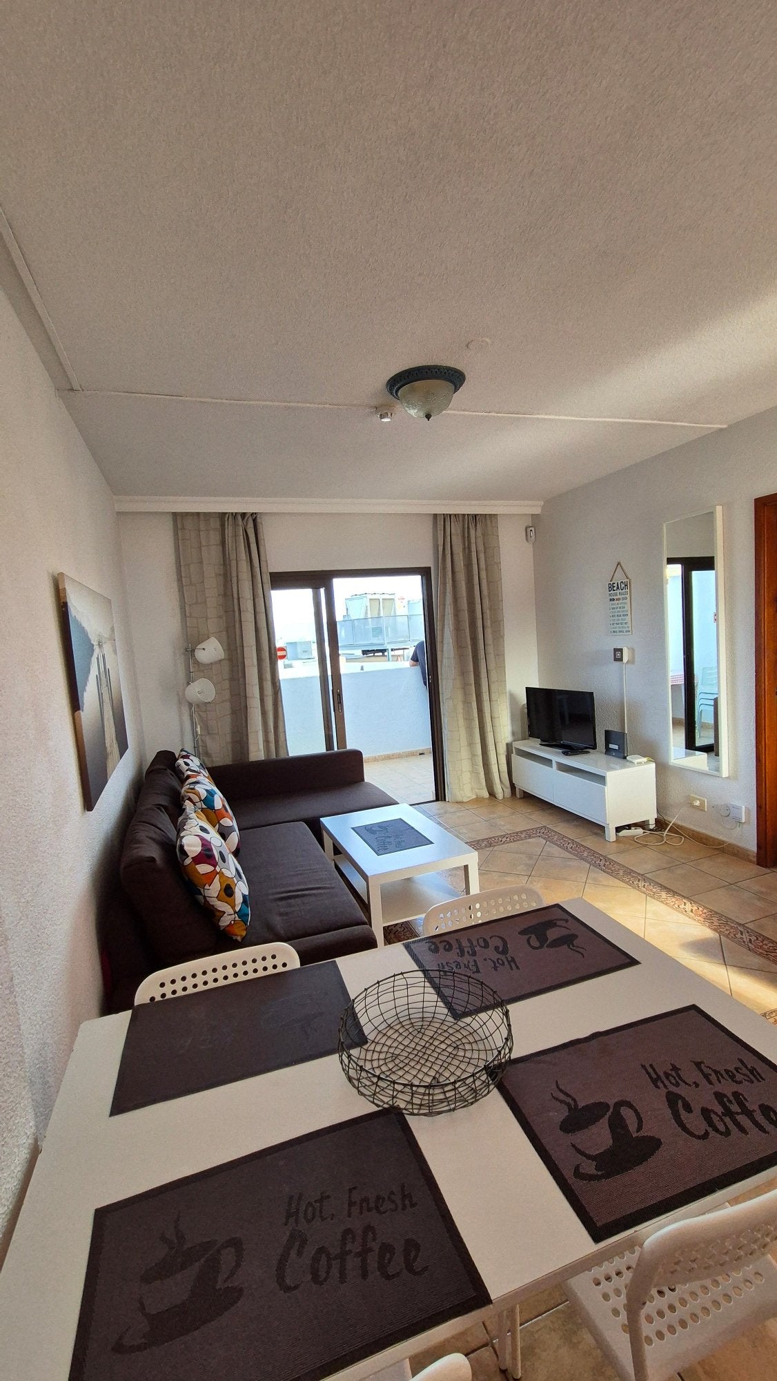Las Americas Cattleya Ocean Oasis Apartment cozy living room with sofa