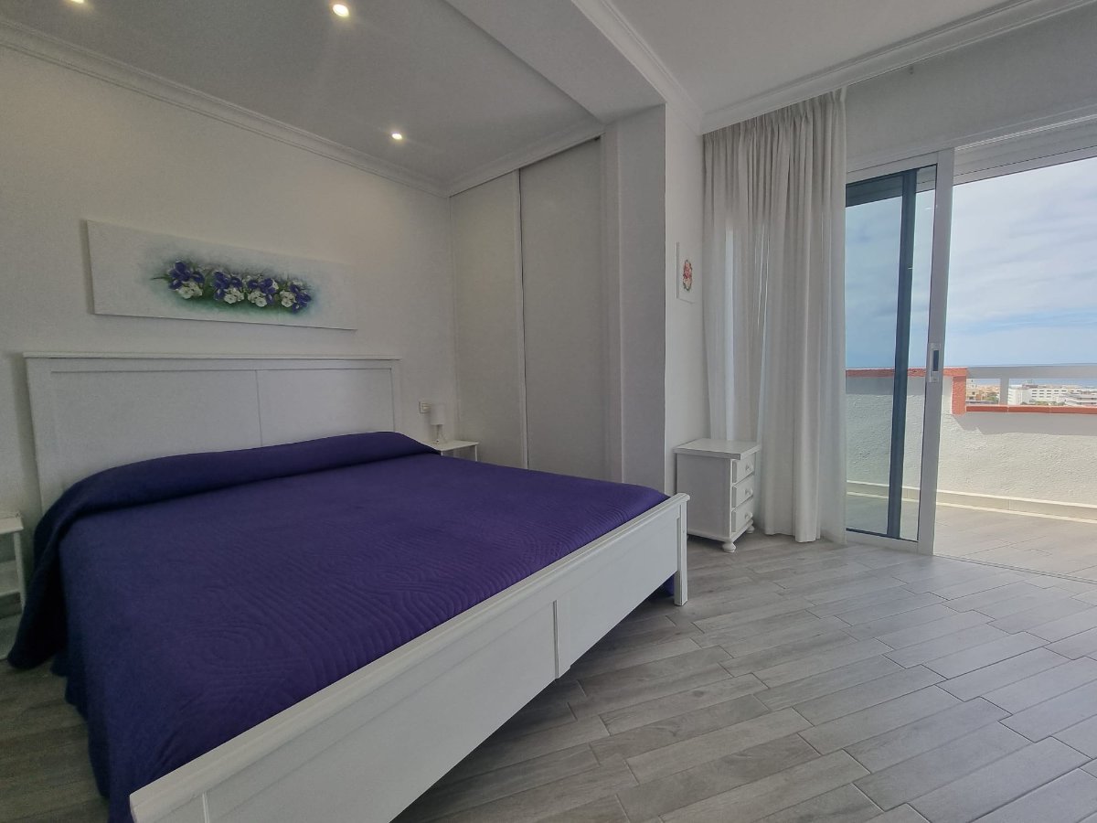 Las Americas Unique Penthouse View stylish bedroom with queen-size bed