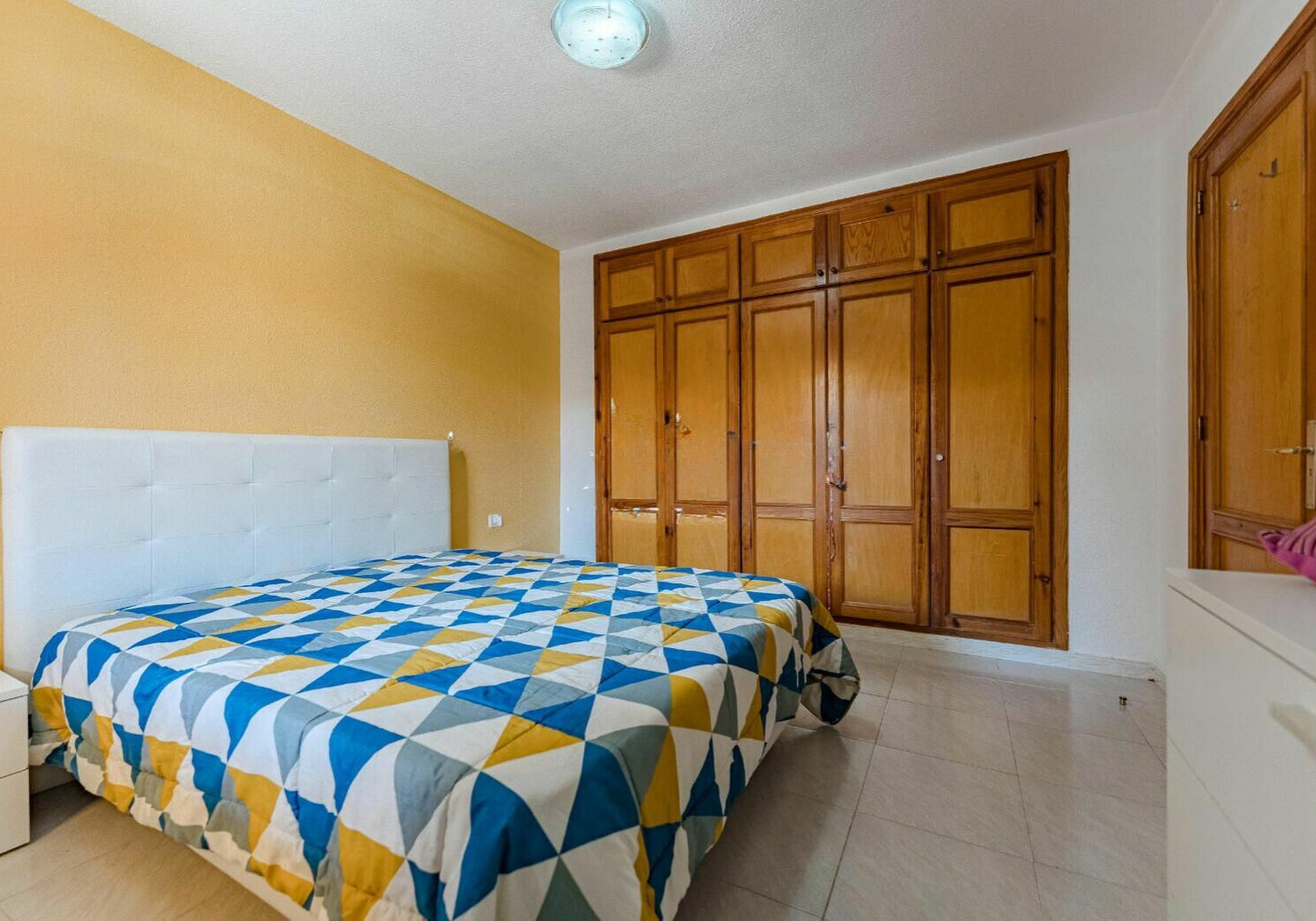 Los Cristianos Charming Apartment Tenerife bedroom with lucid floor