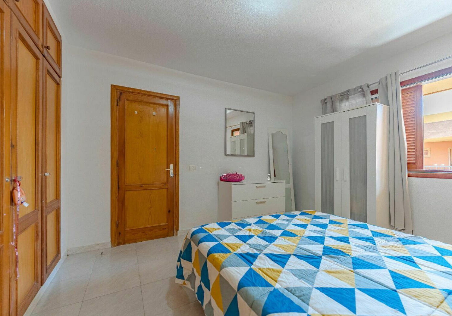 Los Cristianos Charming Apartment Tenerife bedroom with modern amenities