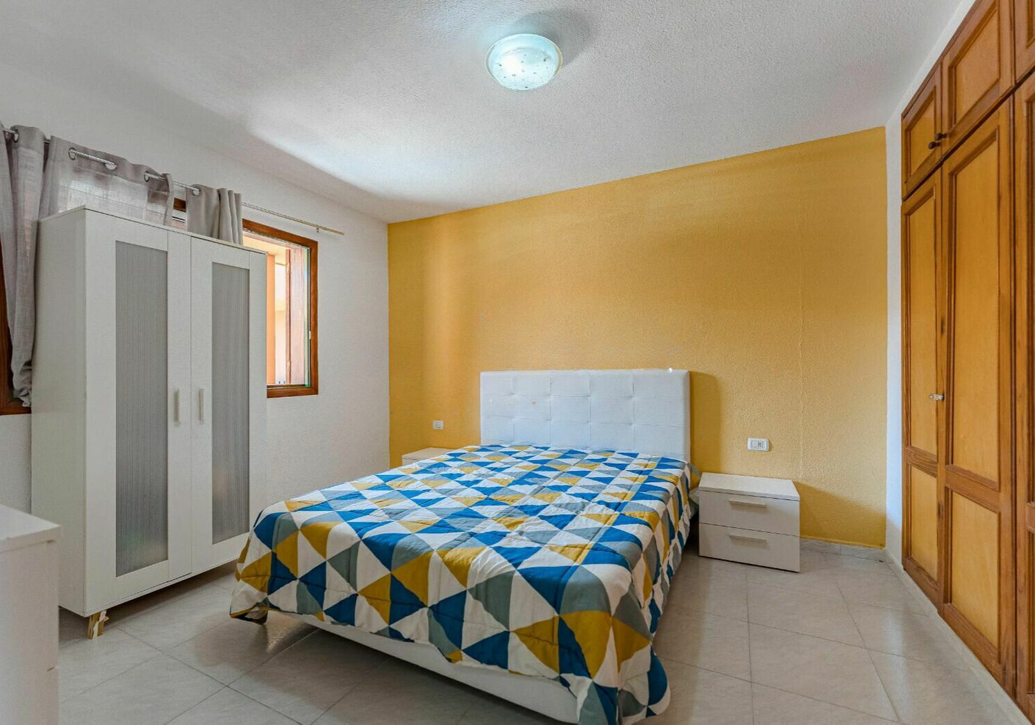 Los Cristianos Charming Apartment Tenerife bedroom with queen-size bed