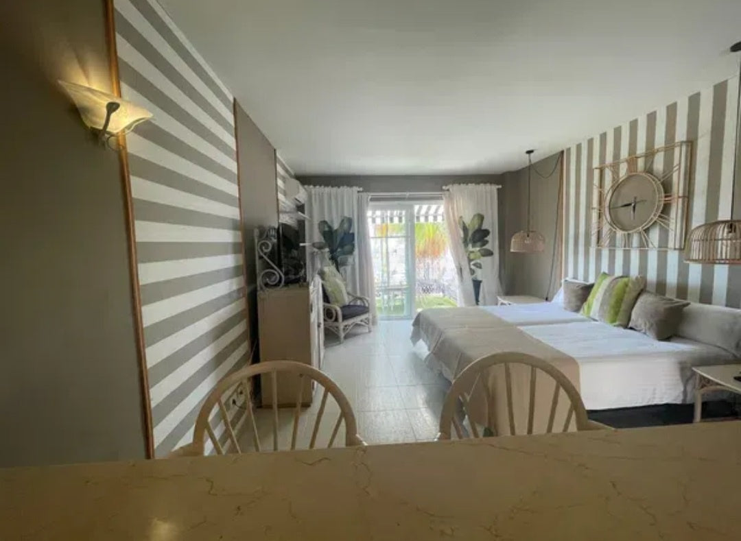 Los Cristianos Dream Duplex Tenerife second bedroom with stylish amenities and terrace 