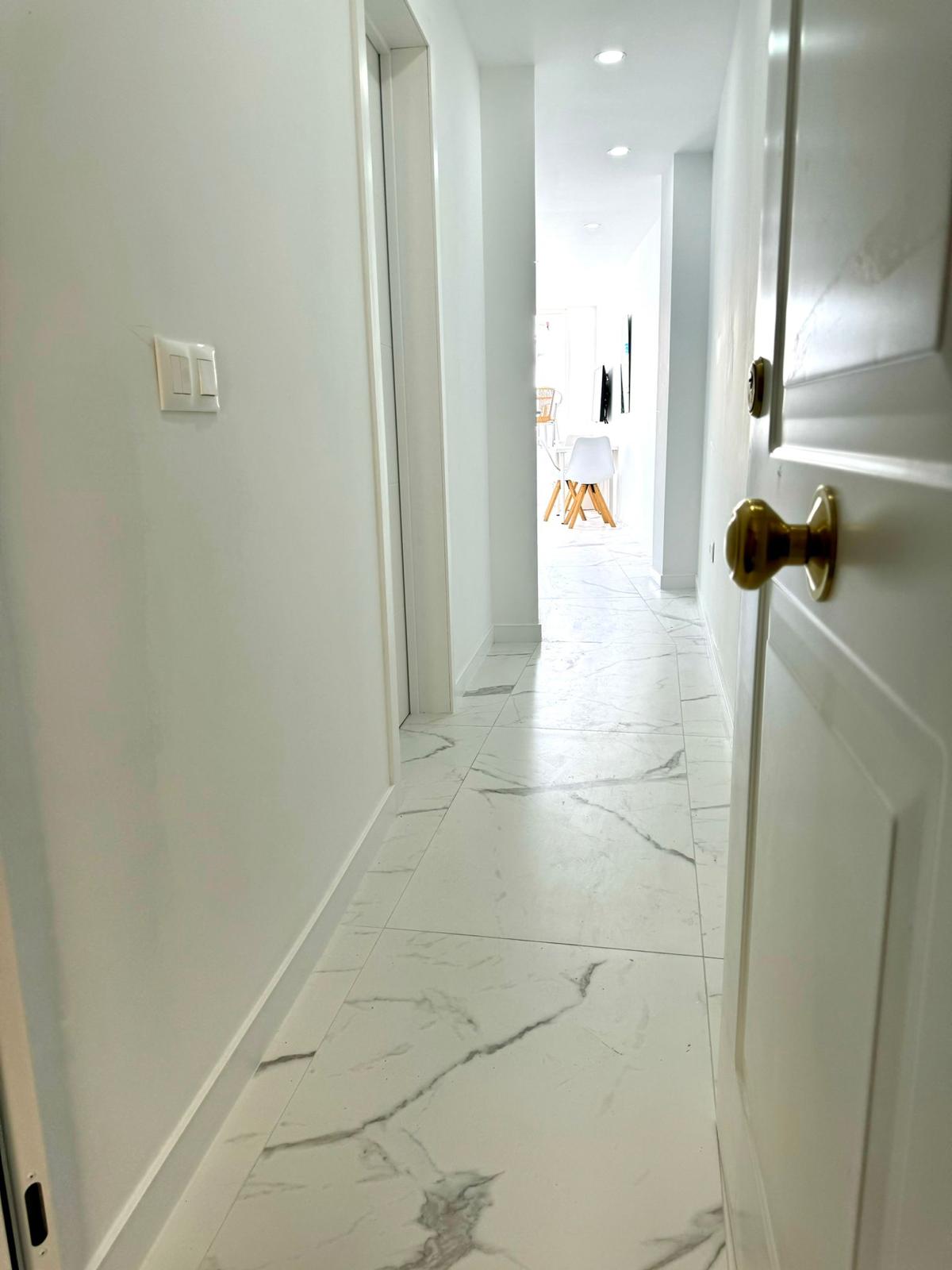 Los_Cristianos_Must-See_Beachfront_Apartment_with_Stunning_Ocean_Views_in_Tenerife_entrance_reinforced_door_safety