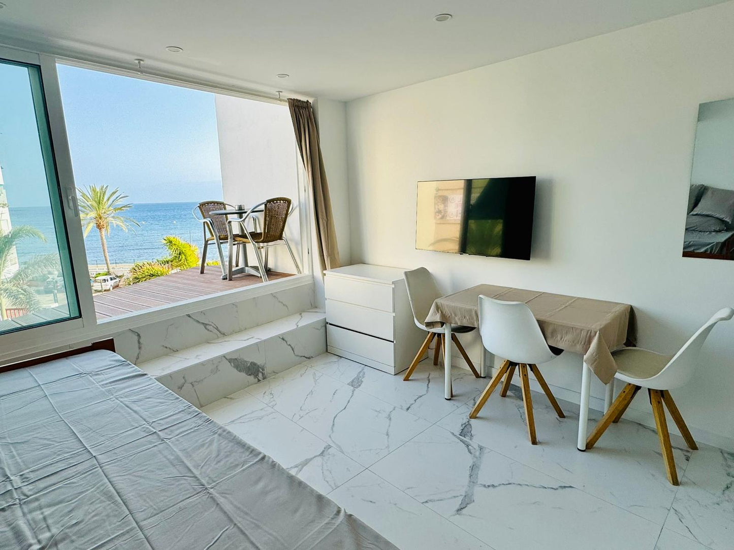 Los_Cristianos_Must-See_Beachfront_Apartment_with_Stunning_Ocean_Views_in_Tenerife_flat_screen_tv