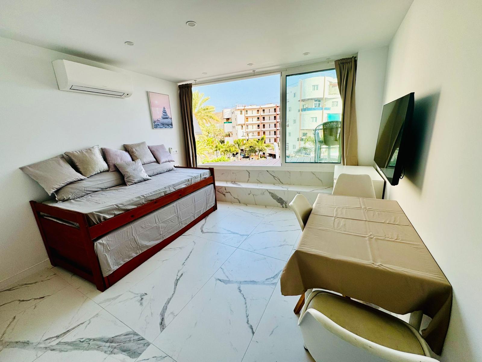 Los_Cristianos_Must-See_Beachfront_Apartment_with_Stunning_Ocean_Views_in_Tenerife_large_window