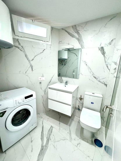 Los_Cristianos_Must-See_Beachfront_Apartment_with_Stunning_Ocean_Views_in_Tenerife_marble_bathroom