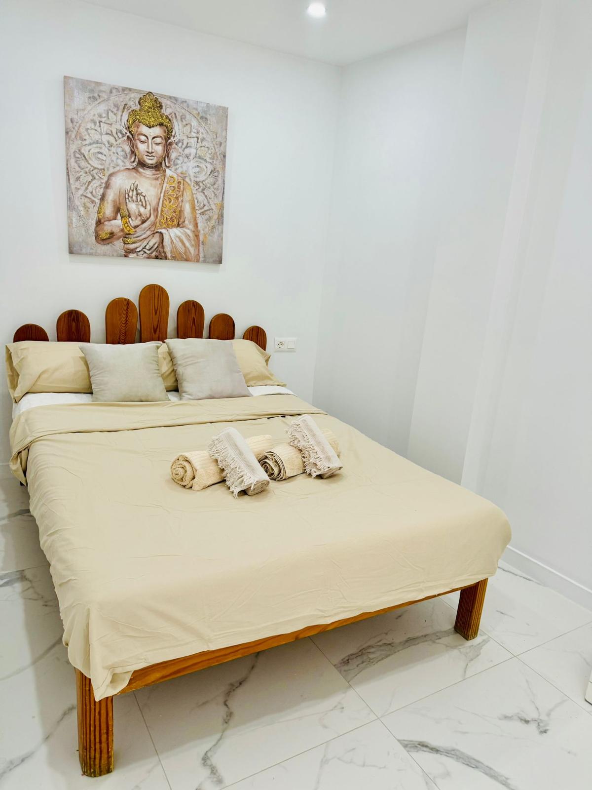 Los_Cristianos_Must-See_Beachfront_Apartment_with_Stunning_Ocean_Views_in_Tenerife_minimalist_bedroom