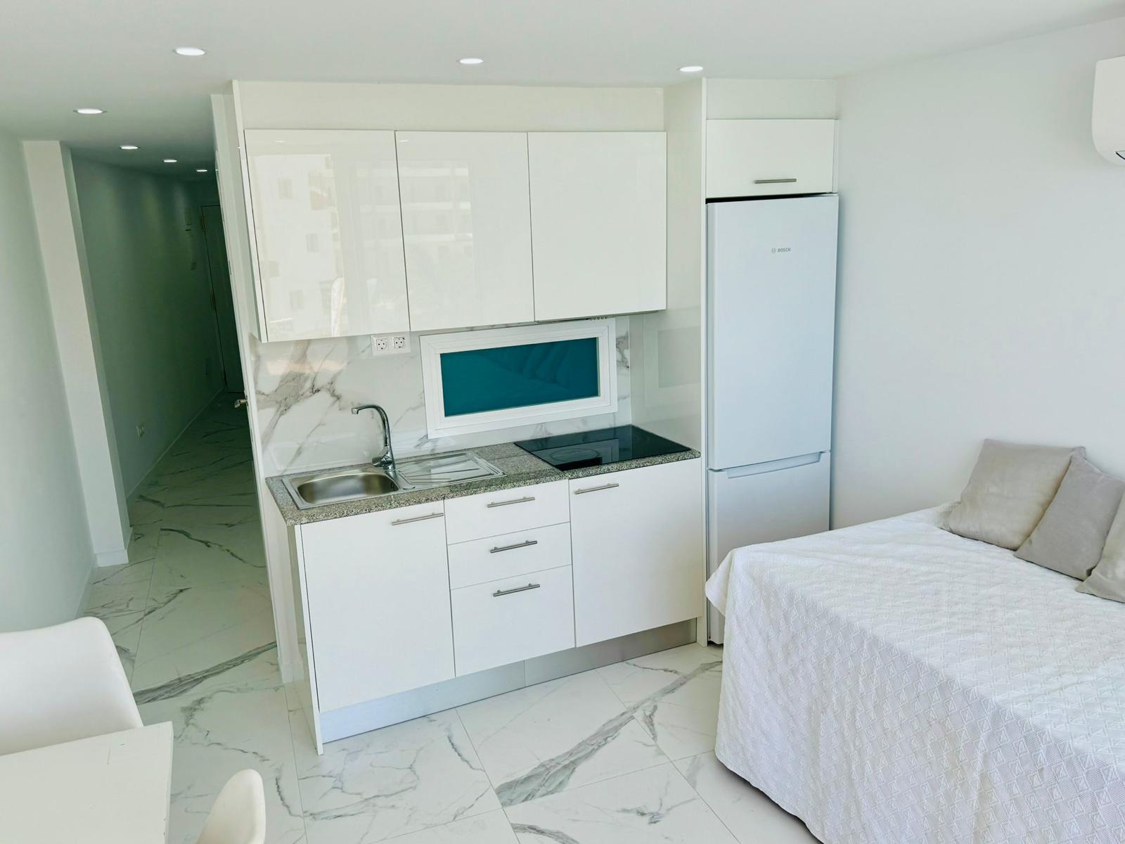 Los_Cristianos_Must-See_Beachfront_Apartment_with_Stunning_Ocean_Views_in_Tenerife_new_fridge
