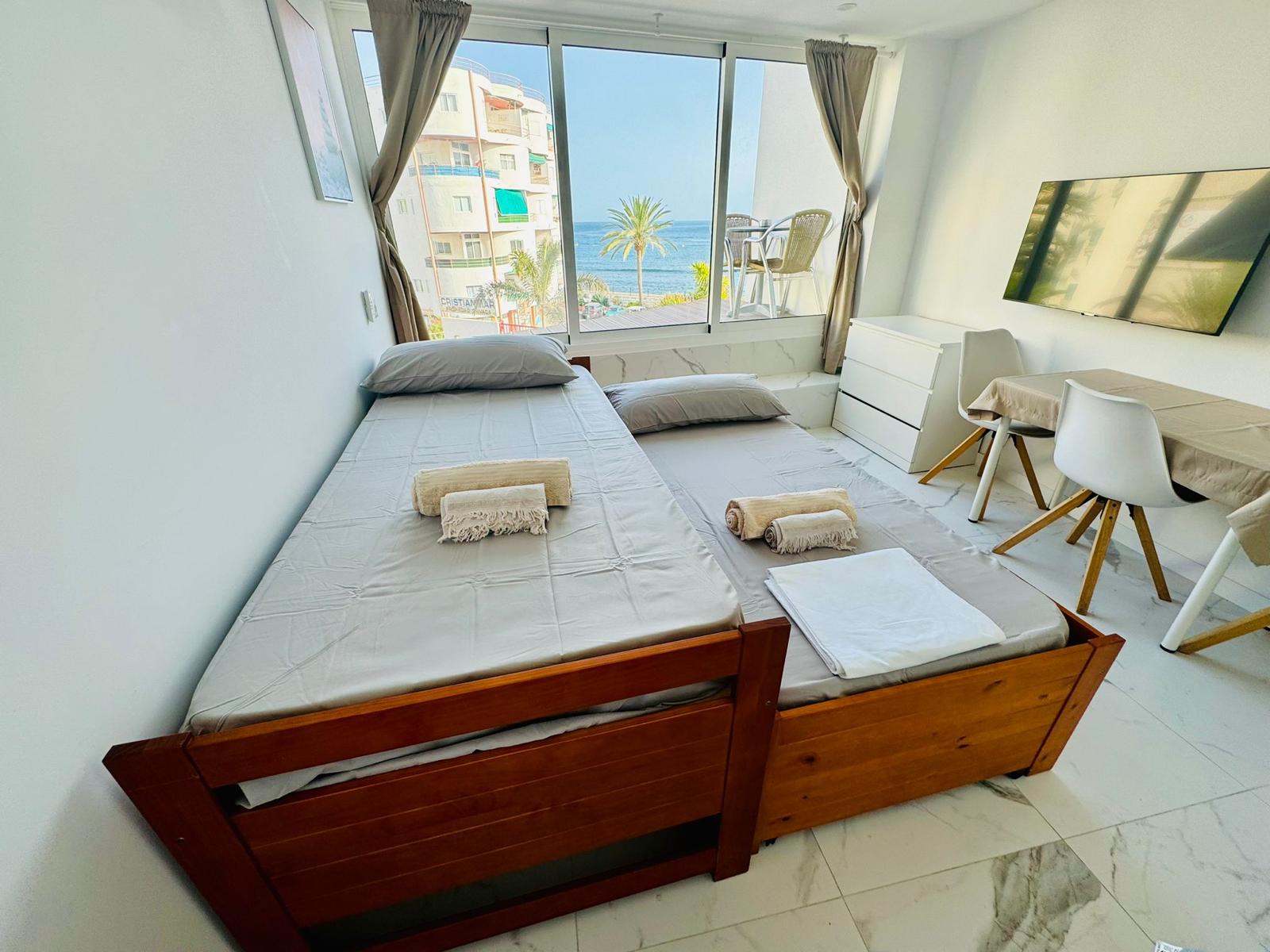 Los_Cristianos_Must-See_Beachfront_Apartment_with_Stunning_Ocean_Views_in_Tenerife_sofa_bed_first_position