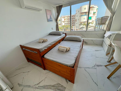Los_Cristianos_Must-See_Beachfront_Apartment_with_Stunning_Ocean_Views_in_Tenerife_sofa_bed_flexible