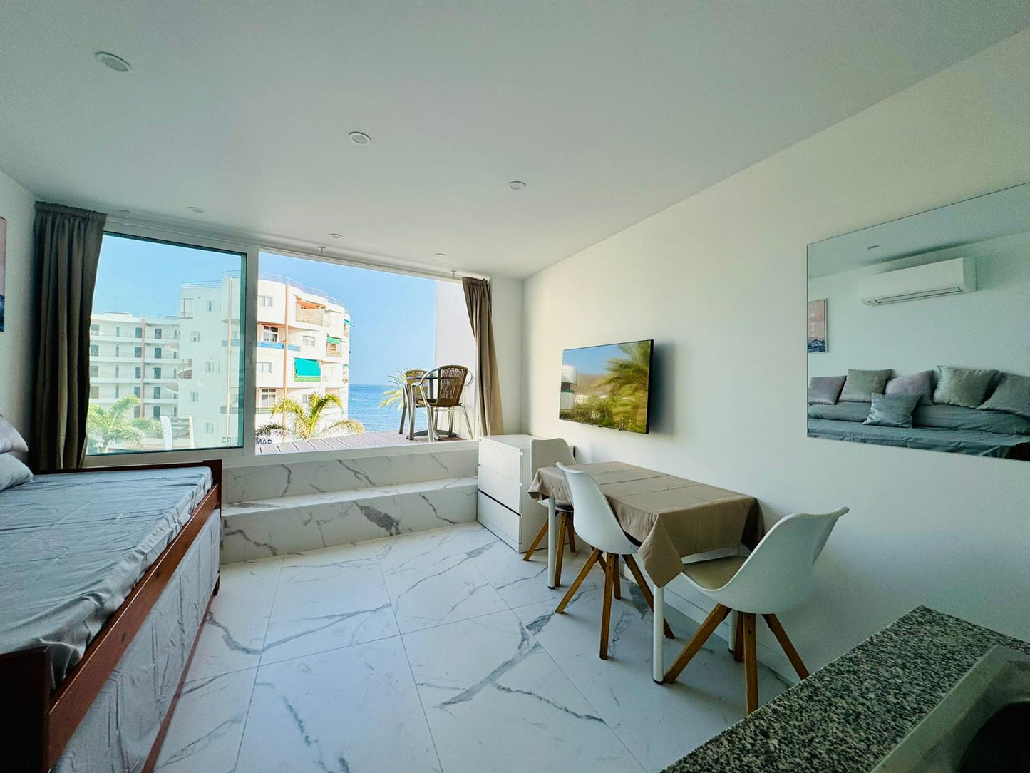 Los_Cristianos_Must-See_Beachfront_Apartment_with_Stunning_Ocean_Views_in_Tenerife_summer_vibes