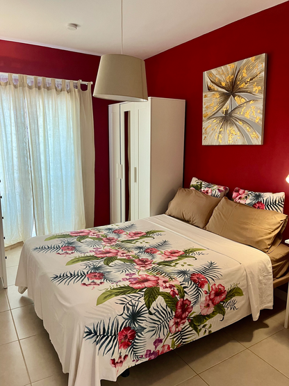 Magnificent Augusta Park Amarilla Golf Apartment bedroom with queen-size bed 4