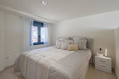 Pal Mar La Arenita Spacious Duplex Penthouse Stylish bedroom with queen-size bed
