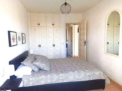 San Miguel de Abona Cozy House at Amarilla Golf spacious bedroom with queen-size bed