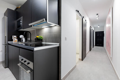 Spacious 2-Bedroom Apartment for Sale in Playa Paraíso Minimalist modern Open-plan kitchen