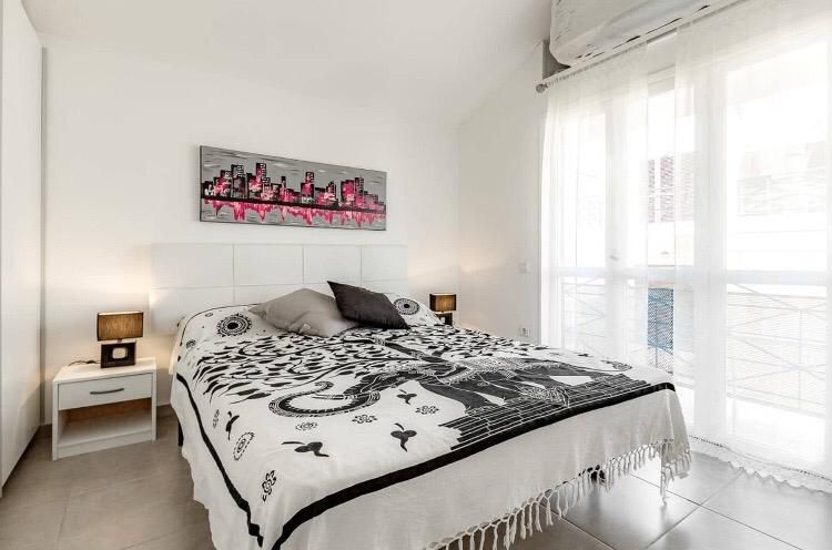 Stylish Apartment with Pool Las Americas Altamar queen-size bed on bedroom 
